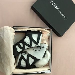 BCBG Black Stiletto lace-up Heels